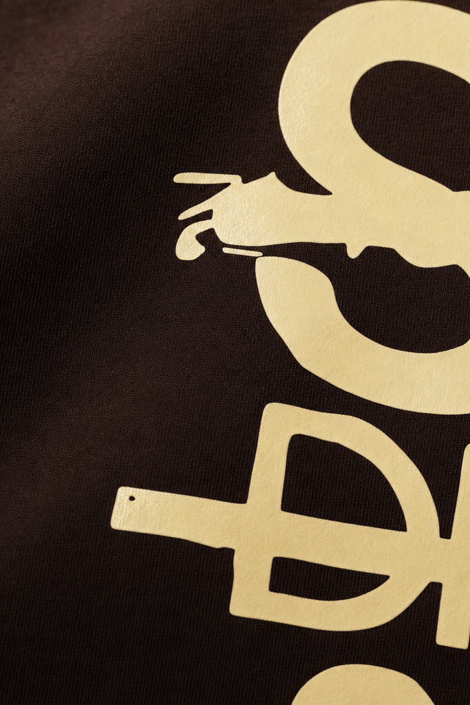 Close-up fabric detail - Voyd Midnight Roast Brown T-shirt