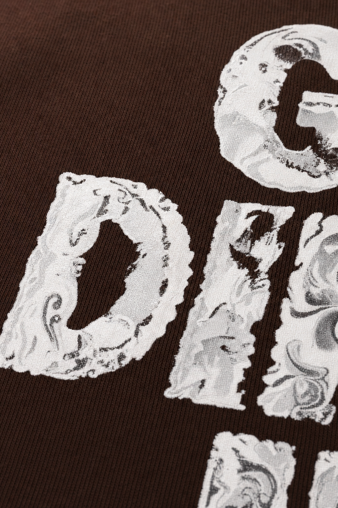 Close-up fabric detail - Voyd Get Dirty Brown T-shirt